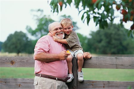 pictures young fat boy glasses - Portrait of a Grandfather and Grandson Stock Photo - Rights-Managed, Code: 700-00357771