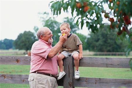 pictures young fat boy glasses - Portrait of a Grandfather and Grandson Stock Photo - Rights-Managed, Code: 700-00357773