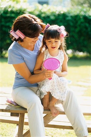 Mère et fille avec bigoudis dans les cheveux Photographie de stock - Rights-Managed, Code: 700-00350205