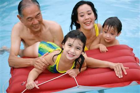 swimming grandparent - Family in Pool Stock Photo - Rights-Managed, Code: 700-00350237