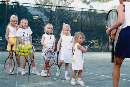 Tennis Instructor Teaching Kids Stock Photo - Rights-Managed, Code: 700-00350244