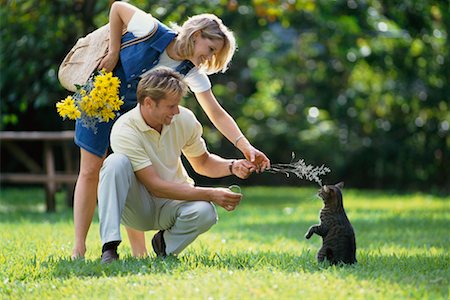 flower bending over - Couple and Cat Stock Photo - Rights-Managed, Code: 700-00350241