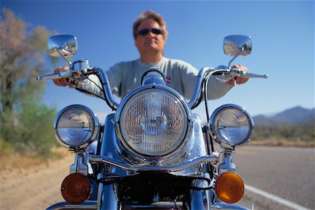 Man Riding Motorcycle Foto de stock - Con derechos protegidos, Código: 700-00350254