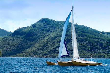 simsearch:700-00424633,k - Trimaran Racing Sailboat Tahaa, French Polynesia Stock Photo - Rights-Managed, Code: 700-00350388