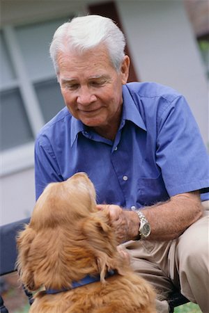 simsearch:700-00350535,k - Man Petting His Dog Foto de stock - Direito Controlado, Número: 700-00350621