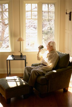 Man Looking Out Window Stock Photo - Rights-Managed, Code: 700-00350640