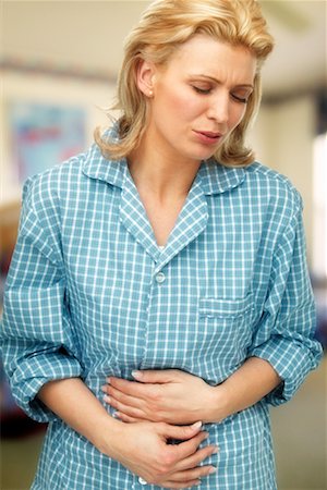 Woman with Stomach Ache Stock Photo - Rights-Managed, Code: 700-00350658