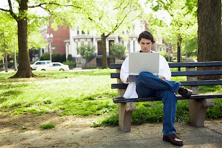 Man Sitting on a Park Bench Stock Photo - Rights-Managed, Code: 700-00351071