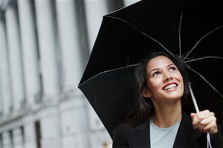 rainy new york city - Woman Holding Umbrella Stock Photo - Rights-Managed, Code: 700-00364035