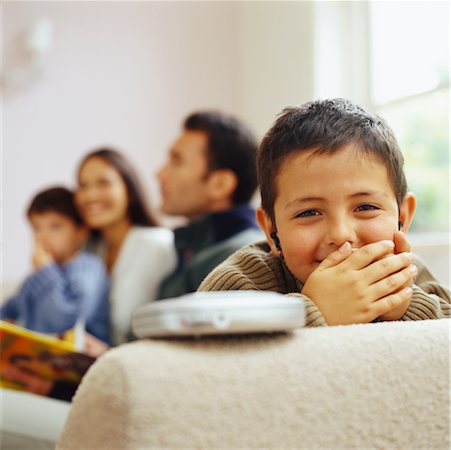 sneaking boy - Boy Listening to Discman Stock Photo - Rights-Managed, Code: 700-00364270