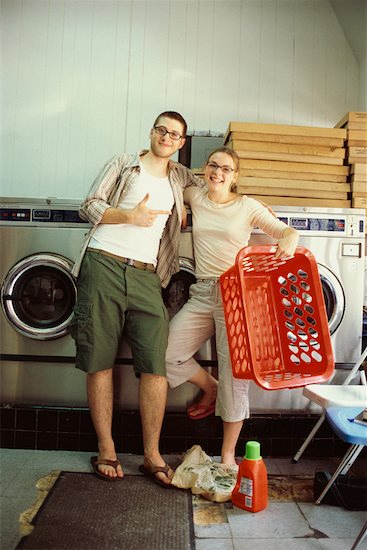 Couple at Laundromat Stock Photo - Premium Rights-Managed, Artist: Michael Goldman, Image code: 700-00365605