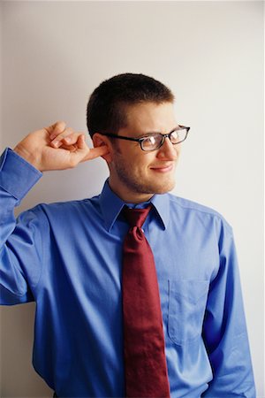 Businessman Scratching His Ear Foto de stock - Direito Controlado, Número: 700-00365610