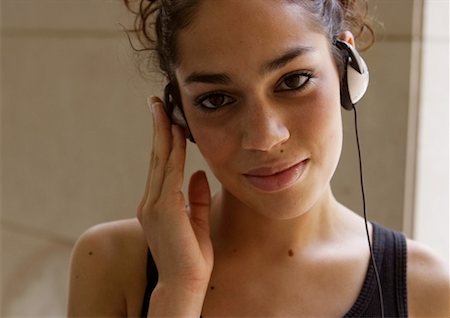Woman Wearing Headphones Stock Photo - Rights-Managed, Code: 700-00365769
