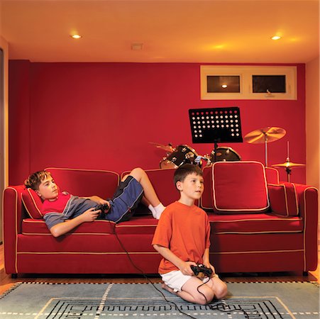 sofa two boys video game - Boys Playing Video Game Stock Photo - Rights-Managed, Code: 700-00365851