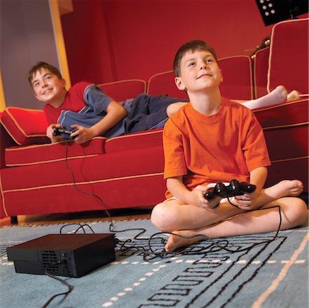 sofa two boys video game - Boys Playing Video Game Stock Photo - Rights-Managed, Code: 700-00365852