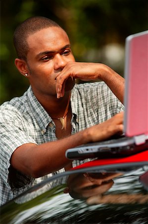 Man Using Laptop Computer Stock Photo - Rights-Managed, Code: 700-00366107