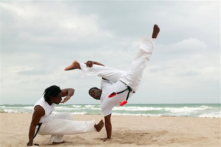 simsearch:700-00366130,k - Practicing Capoeira Stock Photo - Rights-Managed, Code: 700-00366127