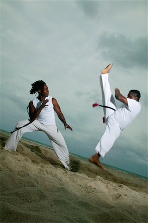 simsearch:700-00366130,k - Practicing Capoeira Stock Photo - Rights-Managed, Code: 700-00366135