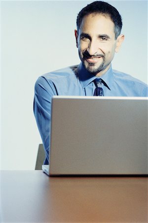 Businessman with Laptop Stock Photo - Rights-Managed, Code: 700-00367555