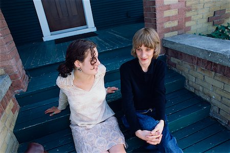 Teens Sitting on Front Steps Stock Photo - Rights-Managed, Code: 700-00367574