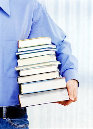 Person Holding Stack of Books Foto de stock - Con derechos protegidos, Código: 700-00367738