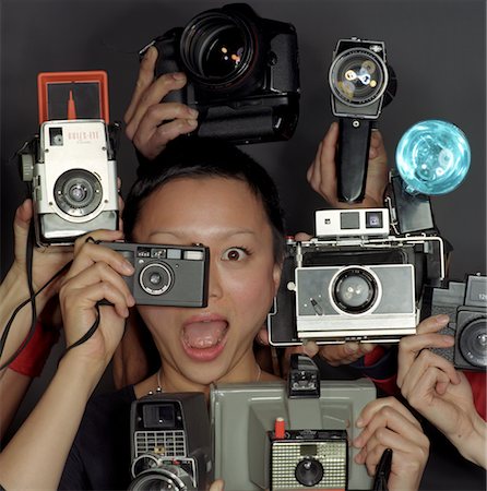 Woman and Cameras Stock Photo - Rights-Managed, Code: 700-00367757