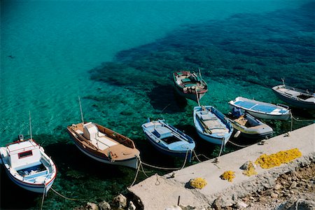 Row of Docked Boats Island of Karpathos, Greece Stock Photo - Rights-Managed, Code: 700-00367804