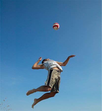 Man Playing Volleyball Stock Photo - Rights-Managed, Code: 700-00367875