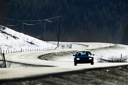 Car on Winding Road in Winter Stock Photo - Rights-Managed, Code: 700-00367871