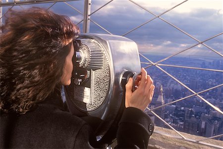 Woman Looking Through View Finder Stock Photo - Rights-Managed, Code: 700-00368179