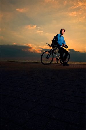 Man with Bicycle Stock Photo - Rights-Managed, Code: 700-00368195