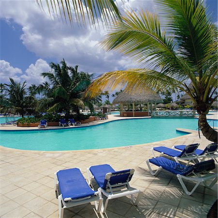 deck chair swimming pool nobody - Coral Canoa Hotel Dominicus Beach Dominican Republic Stock Photo - Rights-Managed, Code: 700-00361016