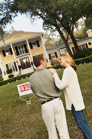 Couple in Front of House for Sale Stock Photo - Rights-Managed, Code: 700-00361239