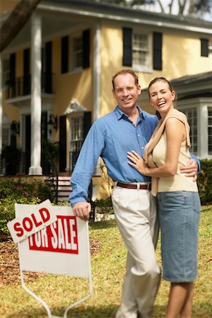 Couple in Front of Sold House Stock Photo - Rights-Managed, Code: 700-00361240