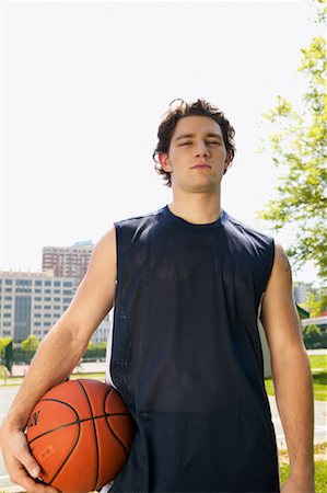 Young Man Holding Basketball Stock Photo - Rights-Managed, Code: 700-00361728