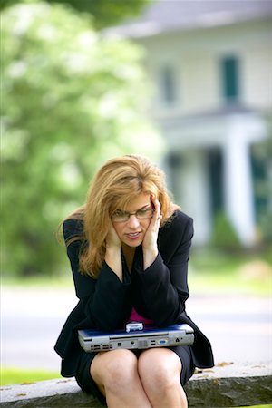 phone with pain - Businesswoman With Headache Outdoors Stock Photo - Rights-Managed, Code: 700-00363402