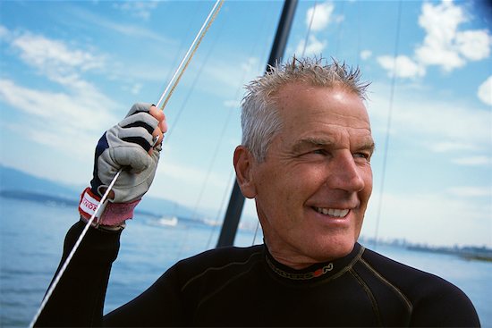 Man on Boat Stock Photo - Premium Rights-Managed, Artist: Jeremy Maude, Image code: 700-00378307