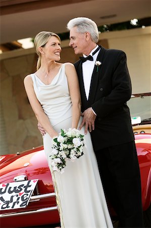 Portrait of Bride and Groom by Car Stock Photo - Rights-Managed, Code: 700-00371262