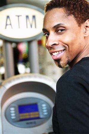 Man Using Banking Machine Foto de stock - Con derechos protegidos, Código: 700-00371708