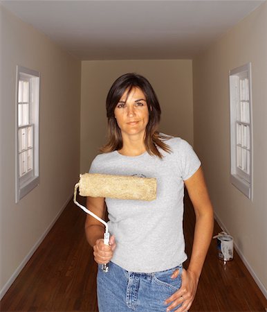 Woman Holding Paint Roller Stock Photo - Rights-Managed, Code: 700-00404016