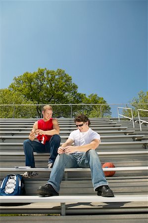 Teenagers Sitting on Bleachers Stock Photo - Rights-Managed, Code: 700-00404198