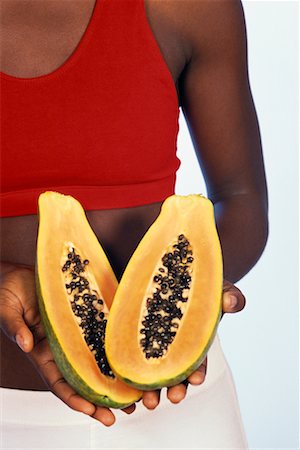 Femme tenant la papaye Photographie de stock - Rights-Managed, Code: 700-00403954