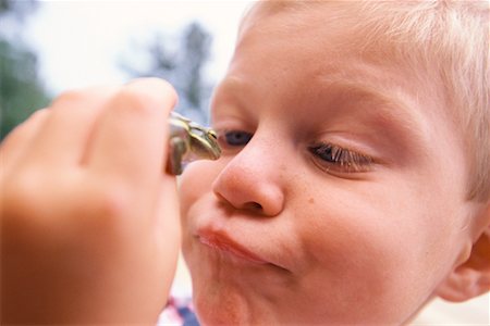 Boy Holding Frog Stock Photo - Rights-Managed, Code: 700-00424050