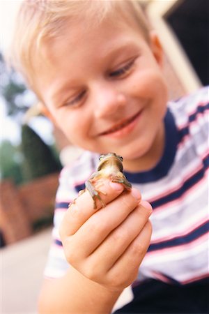 Boy Holding Frog Stock Photo - Rights-Managed, Code: 700-00424053