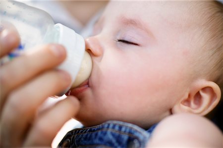 Parent Feeding Baby Stock Photo - Rights-Managed, Code: 700-00424546