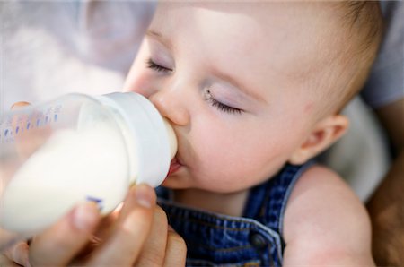 Parent Feeding Baby Stock Photo - Rights-Managed, Code: 700-00424548