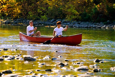 Couple Canoeing Down River Alberta, Canada Stock Photo - Rights-Managed, Code: 700-00424582
