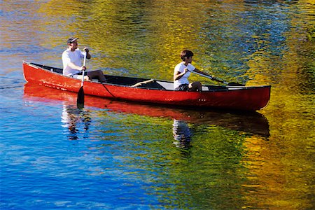 Couple Canoeing Down River Alberta, Canada Stock Photo - Rights-Managed, Code: 700-00424583