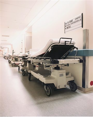 simsearch:600-02883298,k - Empty Hospital Beds in Hallway Stock Photo - Rights-Managed, Code: 700-00424710