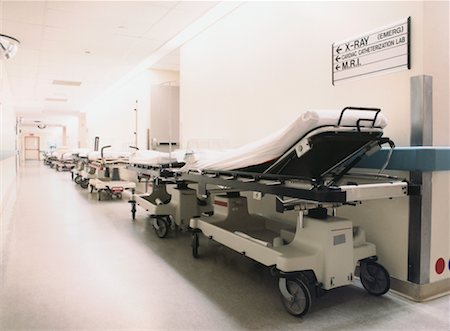 simsearch:600-02883298,k - Empty Hospital Beds in Hallway Stock Photo - Rights-Managed, Code: 700-00424711
